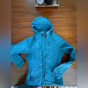 Outdoor Research women’s lightweight down jacket in teal size medium